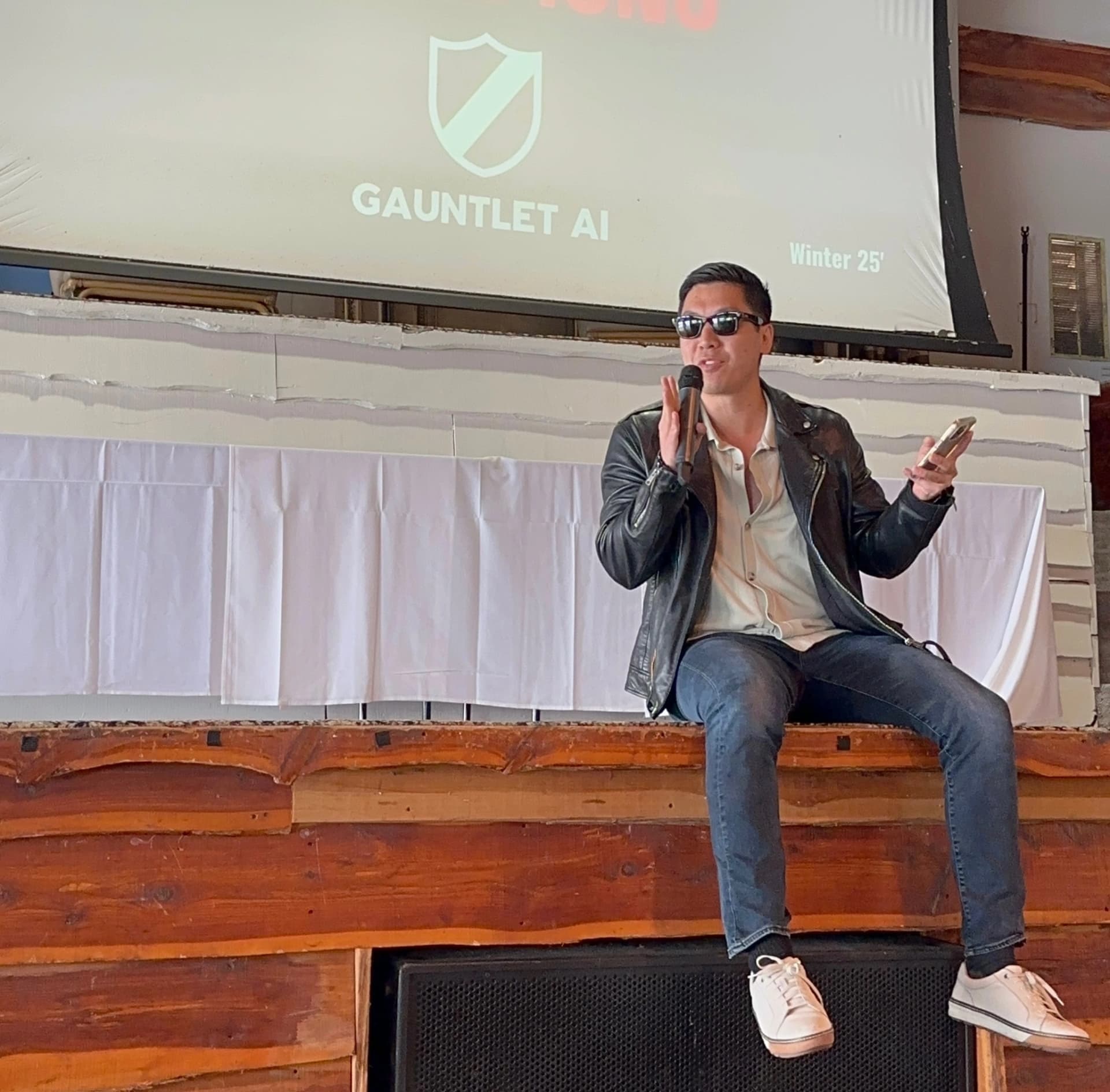 Speaking at the Gauntlet AI graduation in March 2025